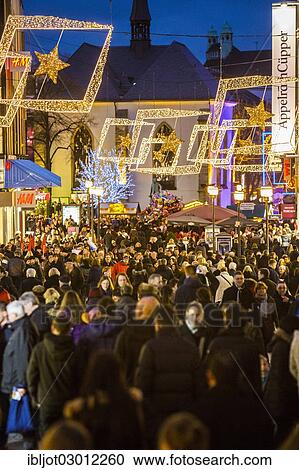 "Crowds thronging between stores and Christmas market stalls, pedestrian street in the centre of Essen, Kettwiger Strasse, Essen, North Rhine-Westphalia, Germany, Europe" View Large Photo Image Stock Image - "Crowds thronging between stores and Christmas market stalls, pedestrian street in the centre of Essen, Kettwiger Strasse, Essen, North Rhine-Westphalia, Germany, Europe". Fotosearch