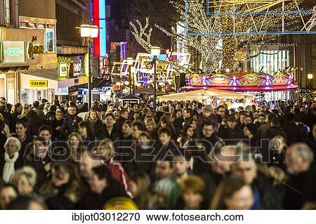 "Crowds thronging between stores and Christmas market stalls, pedestrian street in the centre of Essen, Kettwiger Strasse, Essen, North Rhine-Westphalia, Germany, Europe" View Large Photo Image Stock Image - "Crowds thronging between stores and Christmas market stalls, pedestrian street in the centre of Essen, Kettwiger Strasse, Essen, North Rhine-Westphalia, Germany, Europe". Fotosearch