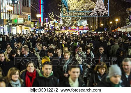 "Crowds thronging between stores and Christmas market stalls, pedestrian street in the centre of Essen, Kettwiger Strasse, Essen, North Rhine-Westphalia, Germany, Europe" View Large Photo Image Stock Image - "Crowds thronging between stores and Christmas market stalls, pedestrian street in the centre of Essen, Kettwiger Strasse, Essen, North Rhine-Westphalia, Germany, Europe". Fotosearch