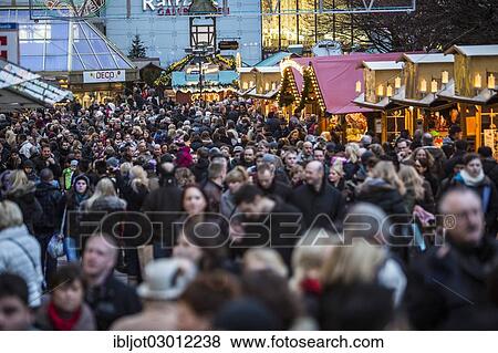 "Crowds thronging between stores and Christmas market stalls, pedestrian street in the centre of Essen, An der Porschekanzel, Essen, North Rhine-Westphalia, Germany, Europe" View Large Photo Image Stock Photo - "Crowds thronging between stores and Christmas market stalls, pedestrian street in the centre of Essen, An der Porschekanzel, Essen, North Rhine-Westphalia, Germany, Europe". Fotosearch