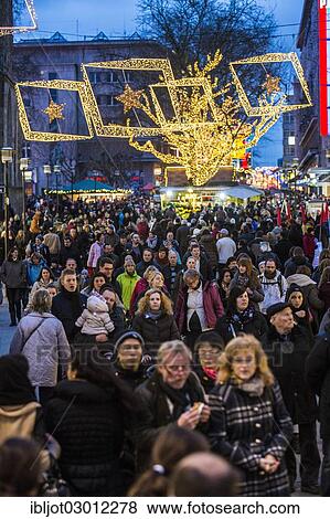 "Crowds thronging between stores and Christmas market stalls, pedestrian street in the centre of Essen, Kettwiger Strasse, Essen, North Rhine-Westphalia, Germany, Europe" View Large Photo Image Stock Photo - "Crowds thronging between stores and Christmas market stalls, pedestrian street in the centre of Essen, Kettwiger Strasse, Essen, North Rhine-Westphalia, Germany, Europe". Fotosearch