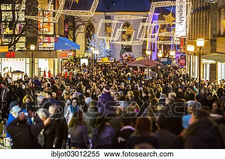 "Crowds thronging between stores and Christmas market stalls, pedestrian street in the centre of Essen, Kettwiger Strasse, Essen, North Rhine-Westphalia, Germany, Europe" View Large Photo Image Stock Photography - "Crowds thronging between stores and Christmas market stalls, pedestrian street in the centre of Essen, Kettwiger Strasse, Essen, North Rhine-Westphalia, Germany, Europe". Fotosearch