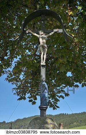 "Crucifix under a summer linden (Tilia platyphyllos), Engelhirsch, Oberallgau, Allgau, Bavaria, Germany, Europe" View Large Photo Image Stock Photography - "Crucifix under a summer linden (Tilia platyphyllos), Engelhirsch, Oberallgau, Allgau, Bavaria, Germany, Europe". Fotosearch