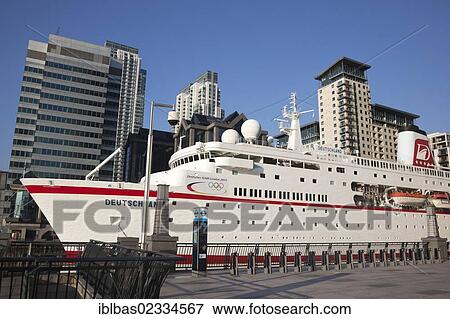 "Cruise liner MS Deutschland moored at West India Dock in Canary Wharf during the 2012 Olympics in London, England, United Kingdom, Europe" View Large Photo Image Stock Photo - "Cruise liner MS Deutschland moored at West India Dock in Canary Wharf during the 2012 Olympics in London, England, United Kingdom, Europe". Fotosearch