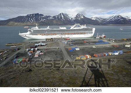 "Cruise ship, Grand Princess from Princess Cruises, moored in the port of Longyearbyen, shadow of a historic coal cable car in the foreground, Spitsbergen, Svalbard, Norway, Europe" View Large Photo Image Stock Image - "Cruise ship, Grand Princess from Princess Cruises, moored in the port of Longyearbyen, shadow of a historic coal cable car in the foreground, Spitsbergen, Svalbard, Norway, Europe". Fotosearch