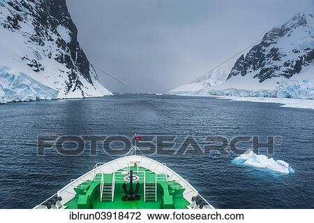 Stock Image - "Cruise ship in the Lemaire Channel, Antarctica". Fotosearch