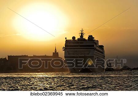 Stock Photography - "Cruise ship MSR ARMONIA, built in 2001, 251m, 1700 passengers, evening departure, Venice, Veneto, Italy, Europe". Fotosearch