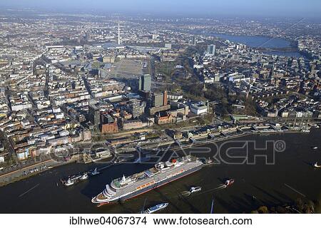 "Cruise ship Queen Victoria on the Elbe in front of the city center with television tower and Alster, Hamburg, Germany, Europe" View Large Photo Image Picture - "Cruise ship Queen Victoria on the Elbe in front of the city center with television tower and Alster, Hamburg, Germany, Europe". Fotosearch