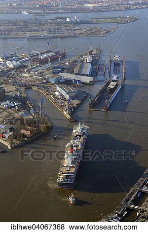 "Cruise ship Queen Victoria, on the left the flooded Elbe 17 dry dock, Hamburg, Germany, Europe" View Large Photo Image Stock Photo - "Cruise ship Queen Victoria, on the left the flooded Elbe 17 dry dock, Hamburg, Germany, Europe". Fotosearch