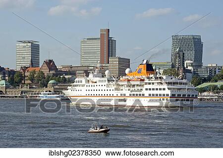 Stock Image - "Cruise ship, St. Pauli Landing Bridges, harbour, Hamburg, Germany, Europe". Fotosearch