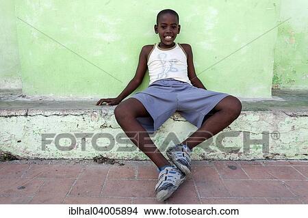 "Cuban boy in Plaza San Juan de Dios, Camaguey, Cuba, North America" View Large Photo Image Picture - "Cuban boy in Plaza San Juan de Dios, Camaguey, Cuba, North America". Fotosearch