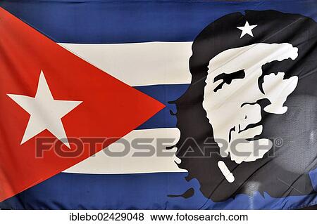 "Cuban flag with a portrait of Che Guevara, in the centre of Santa Clara, Cuba, Greater Antilles, Caribbean, Central America, America, North America" View Large Photo Image Stock Photo - "Cuban flag with a portrait of Che Guevara, in the centre of Santa Clara, Cuba, Greater Antilles, Caribbean, Central America, America, North America". Fotosearch