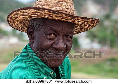 "Cuban man wearing a straw hat, portrait, near Santiago de Cuba, Cuba, North America" View Large Photo Image Stock Image - "Cuban man wearing a straw hat, portrait, near Santiago de Cuba, Cuba, North America". Fotosearch