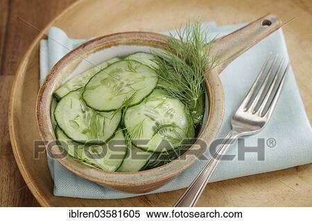 Cucumber salad with vinegar-oil dressing and dill View Large Photo Image Stock Photography - Cucumber salad with vinegar-oil dressing and dill. Fotosearch