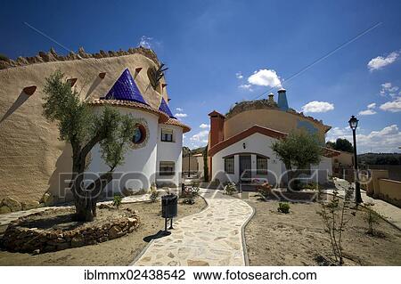 Stock Image - "Cuevas La Granja, cave dwellings, modern designer hotel built deep into a rock to provide a pleasant climate in the rooms throughout the year, Benalua, Andalusia, Spain, Europe". Fotosearch