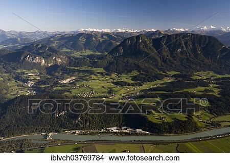 Picture - "Cultural landscape in the Tyrolean lowlands, view from the Inn valley towards the Hohe Tauern, Kirchbichl, Tyrol, Austria, Europe". Fotosearch