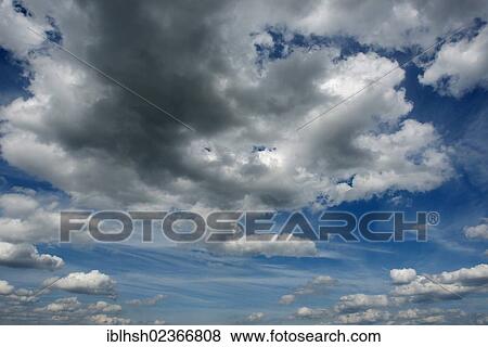 Cumulus clouds in the sky View Large Photo Image Stock Photo - Cumulus clouds in the sky. Fotosearch