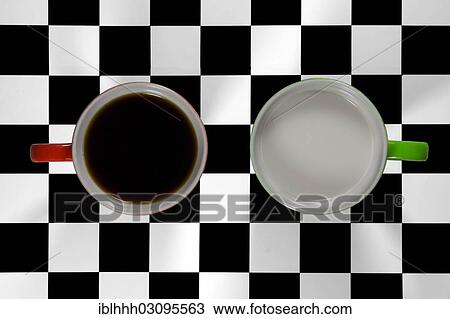Stock Image - Cup of coffee and a cup of milk. Fotosearch