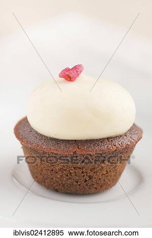 Stock Photography - Cupcake on a plate. Fotosearch
