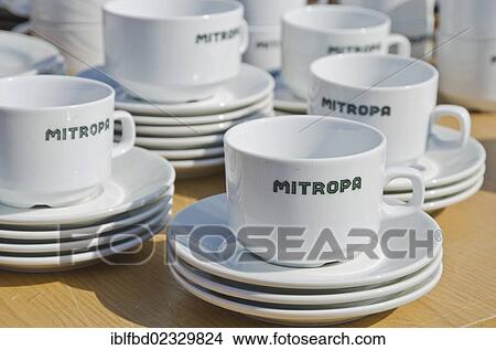 "Cups and plates of the former GDR railway restaurant Mitropa at the weekly flea market, Dresden, Saxony, Germany, Europe" View Large Photo Image Picture - "Cups and plates of the former GDR railway restaurant Mitropa at the weekly flea market, Dresden, Saxony, Germany, Europe". Fotosearch