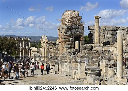 "Cureten Street with the Library of Celsus and the Baths of Scholastica, ancient city of Ephesus, Efes, UNESCO World Heritage Site, Aegean Sea, Turkey, Asia" View Large Photo Image Stock Photograph - "Cureten Street with the Library of Celsus and the Baths of Scholastica, ancient city of Ephesus, Efes, UNESCO World Heritage Site, Aegean Sea, Turkey, Asia". Fotosearch