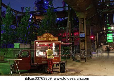 "Currywurst wagon in a disused steelworks, Landscape Park Duisburg-Nord, Ruhr area, North Rhine-Westphalia, Germany, Europe" View Large Photo Image Stock Photo - "Currywurst wagon in a disused steelworks, Landscape Park Duisburg-Nord, Ruhr area, North Rhine-Westphalia, Germany, Europe". Fotosearch