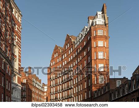 "Curved building, red-brick Victorian Kensington Gore Mansions, Knightsbridge, London, England, United Kingdom, Europe" View Large Photo Image Stock Photo - "Curved building, red-brick Victorian Kensington Gore Mansions, Knightsbridge, London, England, United Kingdom, Europe". Fotosearch
