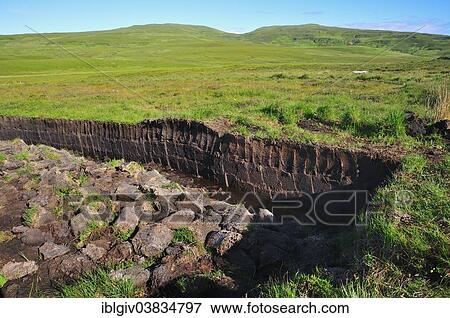 Stock Photo - "Cut peat in a bog on the Trotternish Peninsula, Ross, Skye and Lochaber, Isle of Skye, Scotland, United Kingdom, Europe". Fotosearch
