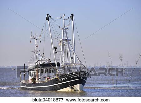 "Cutter off the North Sea resort of Wremen, Cuxhaven district, Lower Saxony, Germany, Europe" View Large Photo Image Stock Photo - "Cutter off the North Sea resort of Wremen, Cuxhaven district, Lower Saxony, Germany, Europe". Fotosearch