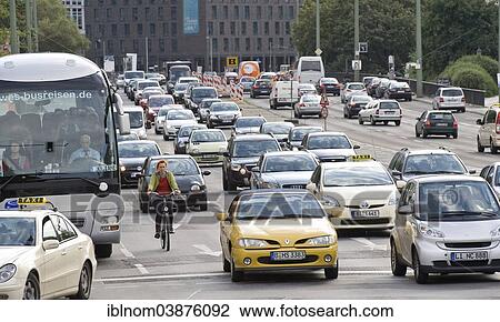 "Cyclist and cars in traffic, Leipziger Strasse, Berlin, Germany, Europe" View Large Photo Image Stock Image - "Cyclist and cars in traffic, Leipziger Strasse, Berlin, Germany, Europe". Fotosearch