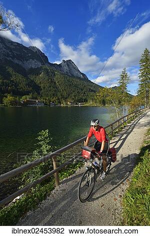 "Cyclist at Hintersee lake, Ramsau, Berchtesgaden, Upper Bavaria, Bavaria, Germany, Europe" View Large Photo Image Stock Image - "Cyclist at Hintersee lake, Ramsau, Berchtesgaden, Upper Bavaria, Bavaria, Germany, Europe". Fotosearch