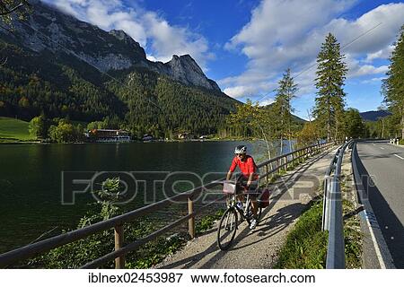 "Cyclist at Hintersee Lake, Ramsau, Berchtesgaden, Upper Bavaria, Bavaria, Germany, Europe" View Large Photo Image Stock Photo - "Cyclist at Hintersee Lake, Ramsau, Berchtesgaden, Upper Bavaria, Bavaria, Germany, Europe". Fotosearch