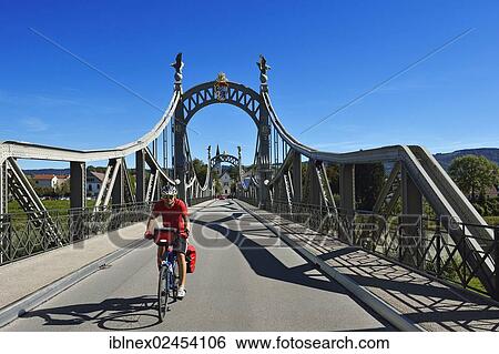 "Cyclist crossing Laenderbruecke bridge between Bavaria and Salzburger Land, Laufen, Chiemgau, Upper Bavaria, Bavaria, Germany, and Oberndorf, Salzburg, Austria, Europe" View Large Photo Image Stock Photograph - "Cyclist crossing Laenderbruecke bridge between Bavaria and Salzburger Land, Laufen, Chiemgau, Upper Bavaria, Bavaria, Germany, and Oberndorf, Salzburg, Austria, Europe". Fotosearch