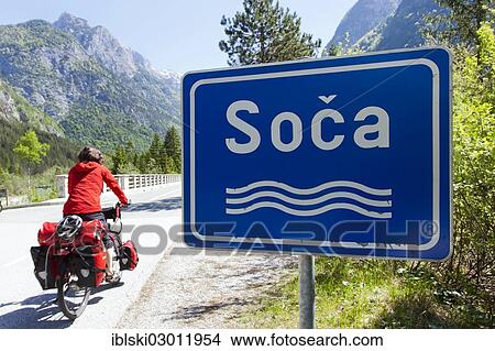 "Cyclist crossing the Soca River in the Soca Valley in Triglav National Park, Julian Alps, near Bovec, Slovenia, Europe" View Large Photo Image Picture - "Cyclist crossing the Soca River in the Soca Valley in Triglav National Park, Julian Alps, near Bovec, Slovenia, Europe". Fotosearch