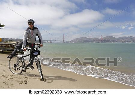 "Cyclist, Golden Gate Bridge at the back, San Francisco, California, USA" View Large Photo Image Stock Image - "Cyclist, Golden Gate Bridge at the back, San Francisco, California, USA". Fotosearch
