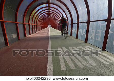 "Cyclist is riding on Scottish Exhibition and Conference Centre Footbridge, Glasgow, Scotland, United Kingdom, Europe" View Large Photo Image Stock Photograph - "Cyclist is riding on Scottish Exhibition and Conference Centre Footbridge, Glasgow, Scotland, United Kingdom, Europe". Fotosearch