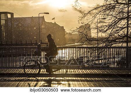 "Cyclist on a bridge over the canal at Sydhavn, South Harbour, Copenhagen, Capital Region of Denmark, Denmark, Europe" View Large Photo Image Stock Image - "Cyclist on a bridge over the canal at Sydhavn, South Harbour, Copenhagen, Capital Region of Denmark, Denmark, Europe". Fotosearch