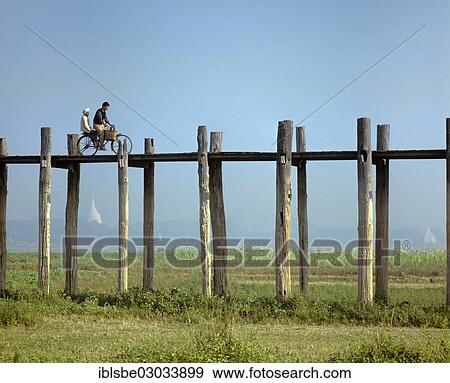 "Cyclist on a teak bridge, U Bein Bridge, Amarapura, Mandalay Division, Myanmar, Burma, Asia" View Large Photo Image Stock Photo - "Cyclist on a teak bridge, U Bein Bridge, Amarapura, Mandalay Division, Myanmar, Burma, Asia". Fotosearch