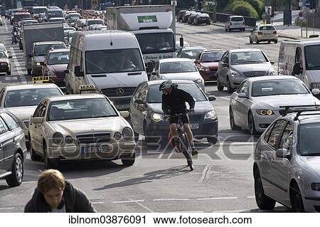 "Cyclists and cars in traffic, Leipziger Strasse, Berlin, Germany, Europe" View Large Photo Image Stock Image - "Cyclists and cars in traffic, Leipziger Strasse, Berlin, Germany, Europe". Fotosearch