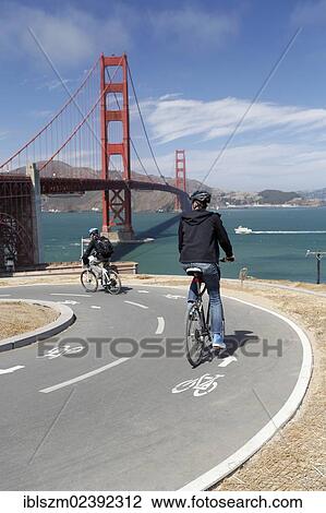 "Cyclists, Golden Gate Bridge at the back, San Francisco, California, USA" View Large Photo Image Stock Image - "Cyclists, Golden Gate Bridge at the back, San Francisco, California, USA". Fotosearch