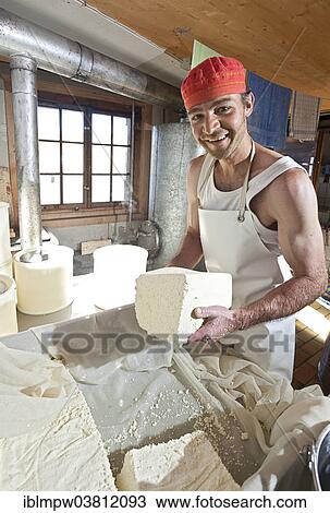 "Dairyman cutting the finished cottage cheese into pieces, Alp Gun, Graubunden, Switzerland, Europe" View Large Photo Image Stock Image - "Dairyman cutting the finished cottage cheese into pieces, Alp Gun, Graubunden, Switzerland, Europe". Fotosearch