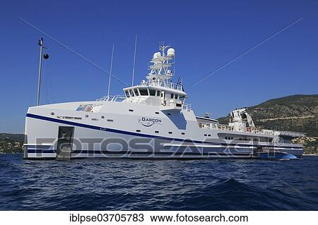 Stock Image - "Damen Sea Axe supply ship Garcon 4 Ace, supply ship for the Ace motor yacht, Beaulieu-sur-Mer, Departement Alpes-Maritimes, Region Provence-Alpes-Cote dâ€™Azur, France, Europe". Fotosearch