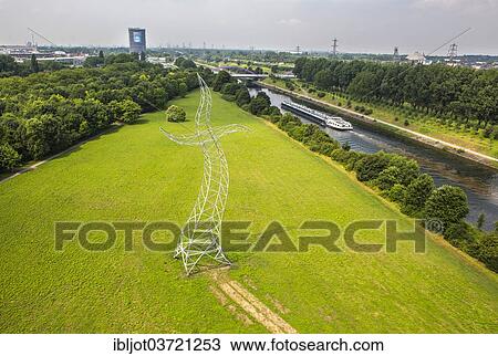 "Dancing high voltage transmission tower, """"Sorcerer's Apprentice"""", art work by the Berlin artist group Inges Idee, Emscherkunst 2013, Oberhausen, North Rhine-Westphalia, Germany, Europe" View Large Photo Image Stock Image - "Dancing high voltage transmission tower, """"Sorcerer's Apprentice"""", art work by the Berlin artist group Inges Idee, Emscherkunst 2013, Oberhausen, North Rhine-Westphalia, Germany, Europe". Fotosearch