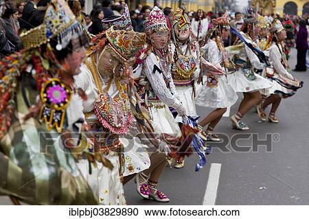 "Dancing masks at the Fiesta del Carmen, Lima, Peru, South America" View Large Photo Image Stock Image - "Dancing masks at the Fiesta del Carmen, Lima, Peru, South America". Fotosearch