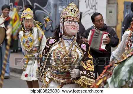 "Dancing masks at the Fiesta del Carmen, Lima, Peru, South America" View Large Photo Image Stock Image - "Dancing masks at the Fiesta del Carmen, Lima, Peru, South America". Fotosearch