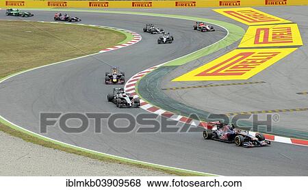 Stock Photo - "Daniil Kwjat, Toro Rosso, followed by Kevin Magnussen, McLaren MP4-29 and Sebastian Vettel, Red Bull RB10, Formula 1, 2014 season, Grand Prix of Spain, Circuit de Barcelona-Catalunya, Montmelo, Spain, Europe". Fotosearch