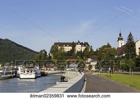 "Danube river, Greinburg Castle and Donaulaende park with floodwalls, Grein, Muehlviertel region, Upper Austria, Austria, Europe" View Large Photo Image Stock Image - "Danube river, Greinburg Castle and Donaulaende park with floodwalls, Grein, Muehlviertel region, Upper Austria, Austria, Europe". Fotosearch