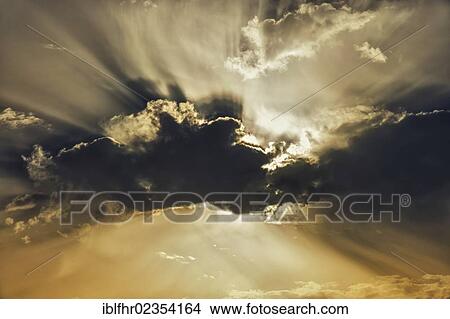 "Dark clouds in front of the sun at sunrise, Grevenbroich, North Rhine-Westphalia, Germany, Europe" View Large Photo Image Picture - "Dark clouds in front of the sun at sunrise, Grevenbroich, North Rhine-Westphalia, Germany, Europe". Fotosearch