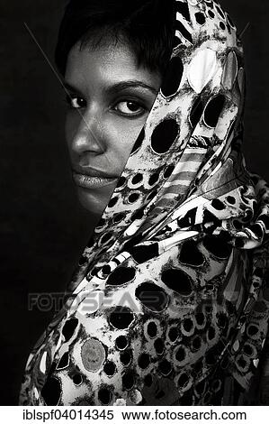 Dark-skinned woman with headscarf View Large Photo Image Stock Photography - Dark-skinned woman with headscarf. Fotosearch