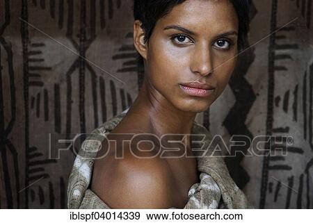Stock Photo - Dark-skinned young woman. Fotosearch